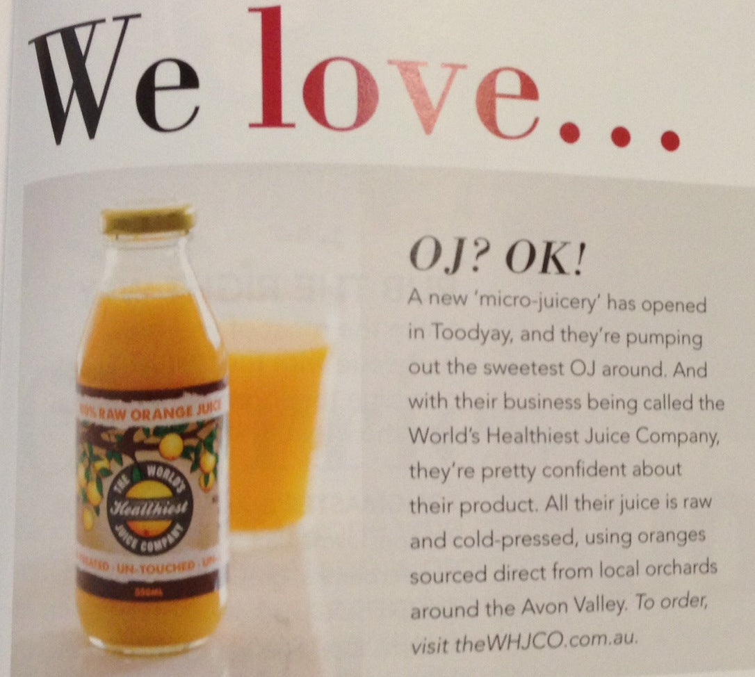 A magazine "We love" clipping featuring a bottle of World's Healthiest Juice Company 100% raw orange juice, about the Toodyay micro-juicery